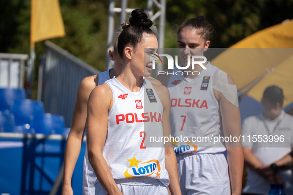 Julia Bazan and Aleksandra Pszczolarska participate in the LOTTO 3x3 League basketball game in Sosnowiec, Poland, on September 6, 2024. The...