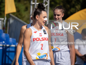 Julia Bazan and Aleksandra Pszczolarska participate in the LOTTO 3x3 League basketball game in Sosnowiec, Poland, on September 6, 2024. The...