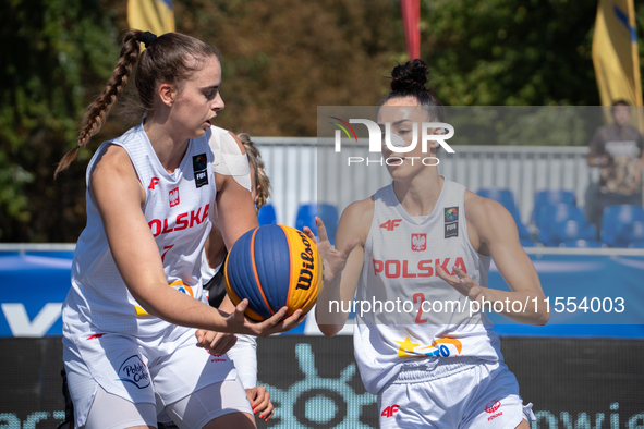 Julia Bazan and Aleksandra Pszczolarska participate in the LOTTO 3x3 League basketball game in Sosnowiec, Poland, on September 6, 2024. The...