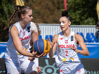 Julia Bazan and Aleksandra Pszczolarska participate in the LOTTO 3x3 League basketball game in Sosnowiec, Poland, on September 6, 2024. The...