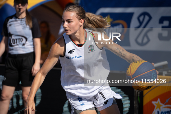 Aleksandra Kuczynska participates in the LOTTO 3x3 League basketball game in Sosnowiec, Poland, on September 6, 2024. The Lotto 3x3 Liga tou...