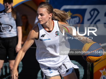 Aleksandra Kuczynska participates in the LOTTO 3x3 League basketball game in Sosnowiec, Poland, on September 6, 2024. The Lotto 3x3 Liga tou...