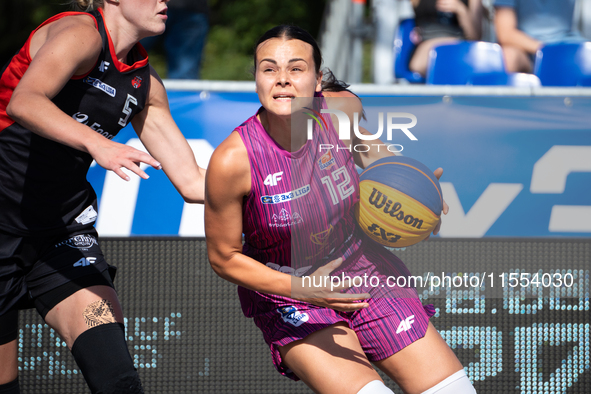 Wiktoria Keller participates in the LOTTO 3x3 League basketball game in Sosnowiec, Poland, on September 6, 2024. The Lotto 3x3 Liga tourname...