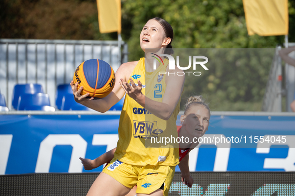 Michalina Fierka participates in the LOTTO 3x3 League basketball game in Sosnowiec, Poland, on September 6, 2024. The Lotto 3x3 Liga tournam...