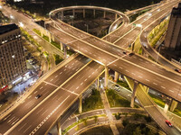 Vehicles run on a viaduct in the urban district of Huai'an City, China, on September 5, 2024. (