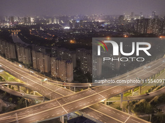 Vehicles run on a viaduct in the urban district of Huai'an City, China, on September 5, 2024. (