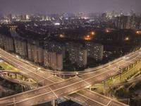 Vehicles run on a viaduct in the urban district of Huai'an City, China, on September 5, 2024. (