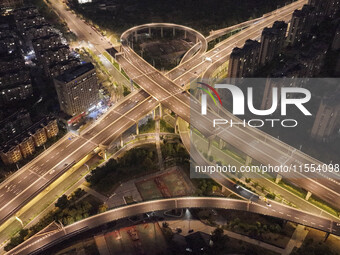 Vehicles run on a viaduct in the urban district of Huai'an City, China, on September 5, 2024. (