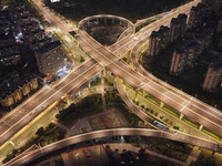 Vehicles run on a viaduct in the urban district of Huai'an City, China, on September 5, 2024. (