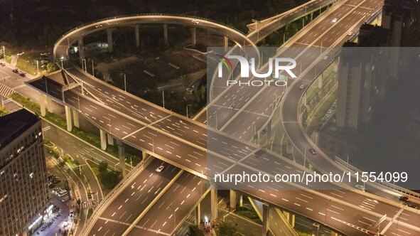 Vehicles run on a viaduct in the urban district of Huai'an City, China, on September 5, 2024. 