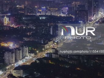 Vehicles run on a viaduct in the urban district of Huai'an City, China, on September 5, 2024. (