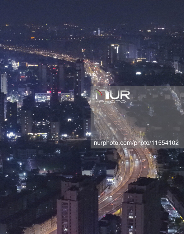 Vehicles run on a viaduct in the urban district of Huai'an City, China, on September 5, 2024. 