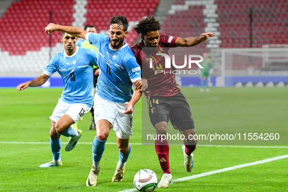 Julien Duranville and Sagiv Jehezkel are in action during Belgium vs Israel: matchday 1 of UEFA Nations League 2024-2025, in Debrecen, Hunga...