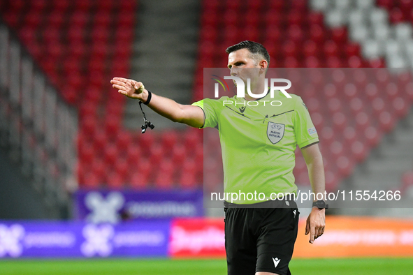 Michael Oliver officiates during Belgium vs Israel: matchday 1 of UEFA Nations League 2024-2025, at Nagyerdei Stadion in Debrecen, Hungary,...