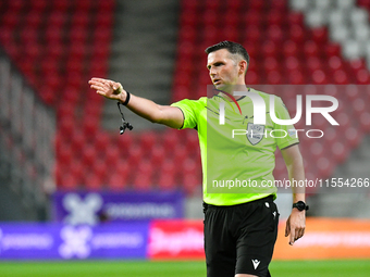 Michael Oliver officiates during Belgium vs Israel: matchday 1 of UEFA Nations League 2024-2025, at Nagyerdei Stadion in Debrecen, Hungary,...