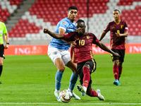 Jeremy Doku and Raz Shlomo are in action during Belgium vs Israel: matchday 1 of UEFA Nations League 2024-2025, at Nagyerdei Stadion in Debr...