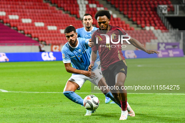 Lois Openda and Raz Shlomo are in action during Belgium vs Israel: matchday 1 of UEFA Nations League 2024-2025, in Debrecen, Hungary, on Sep...