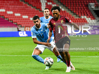 Lois Openda and Raz Shlomo are in action during Belgium vs Israel: matchday 1 of UEFA Nations League 2024-2025, in Debrecen, Hungary, on Sep...