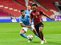 Lois Openda and Raz Shlomo are in action during Belgium vs Israel: matchday 1 of UEFA Nations League 2024-2025, in Debrecen, Hungary, on Sep...