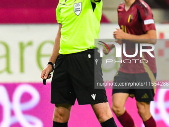 Michael Oliver officiates during Belgium vs Israel: matchday 1 of UEFA Nations League 2024-2025, at Nagyerdei Stadion in Debrecen, Hungary,...