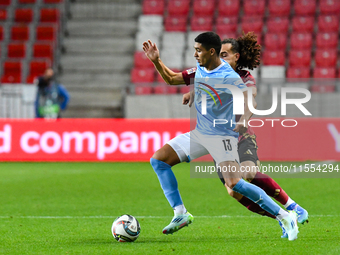 Anan Khalaili and Arthur Theate are in action during Belgium vs Israel: matchday 1 of UEFA Nations League 2024-2025, at Nagyerdei Stadion in...