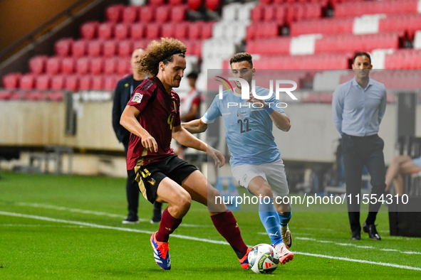 Denny Gropper and Wout Faes are in action during Belgium vs. Israel: matchday 1 of UEFA Nations League 2024-2025, in Debrecen, Hungary, on S...