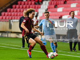 Denny Gropper and Wout Faes are in action during Belgium vs. Israel: matchday 1 of UEFA Nations League 2024-2025, in Debrecen, Hungary, on S...