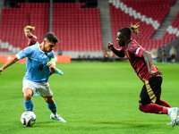 Jeremy Doku and Manor Solomon are in action during Belgium vs Israel: matchday 1 of UEFA Nations League 2024-2025, in Debrecen, Hungary, on...