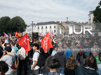 Thousands of protesters march during a protest after the appointment of a right-wing prime minister two days ago following July snap electio...