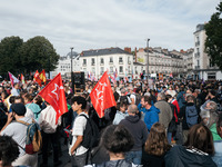 Thousands of protesters march during a protest after the appointment of a right-wing prime minister two days ago following July snap electio...