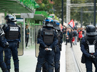 Protestors face the police during a protest after the appointment of a right-wing prime minister two days ago following July snap elections,...