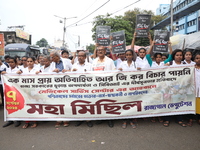 Medical students and doctors shout slogans during a protest rally towards Raj Bhavan, the official residence of the Governor of West Bengal...