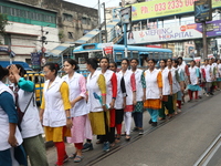 Medical students and doctors shout slogans during a protest rally towards Raj Bhavan, the official residence of the Governor of West Bengal...