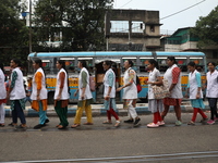 Medical students and doctors shout slogans during a protest rally towards Raj Bhavan, the official residence of the Governor of West Bengal...