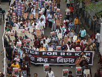 Medical students and doctors shout slogans during a protest rally towards Raj Bhavan, the official residence of the Governor of West Bengal...