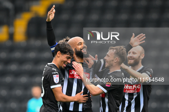 David McGoldrick of Notts County celebrates with teammates after scoring a goal to make it 1-0 during the Sky Bet League 2 match between Not...