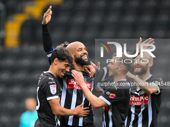 David McGoldrick of Notts County celebrates with teammates after scoring a goal to make it 1-0 during the Sky Bet League 2 match between Not...