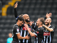 David McGoldrick of Notts County celebrates with teammates after scoring a goal to make it 1-0 during the Sky Bet League 2 match between Not...