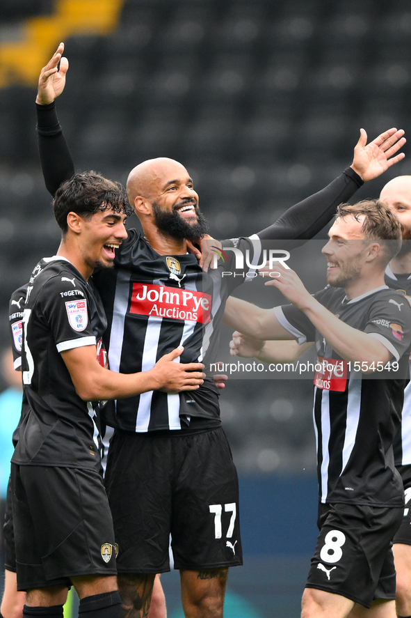 David McGoldrick of Notts County celebrates with teammates after scoring a goal to make it 1-0 during the Sky Bet League 2 match between Not...