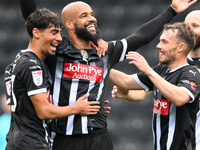 David McGoldrick of Notts County celebrates with teammates after scoring a goal to make it 1-0 during the Sky Bet League 2 match between Not...