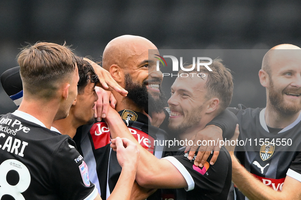 David McGoldrick of Notts County celebrates with teammates after scoring a goal to make it 1-0 during the Sky Bet League 2 match between Not...