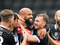 David McGoldrick of Notts County celebrates with teammates after scoring a goal to make it 1-0 during the Sky Bet League 2 match between Not...