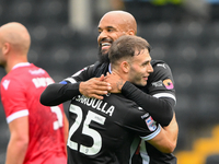 David McGoldrick of Notts County celebrates with Nicholas Tsaroulla of Notts County after scoring a goal to make it 1-0 during the Sky Bet L...