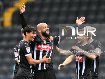 David McGoldrick of Notts County celebrates with teammates after scoring a goal to make it 1-0 during the Sky Bet League 2 match between Not...