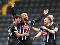 David McGoldrick of Notts County celebrates with teammates after scoring a goal to make it 1-0 during the Sky Bet League 2 match between Not...