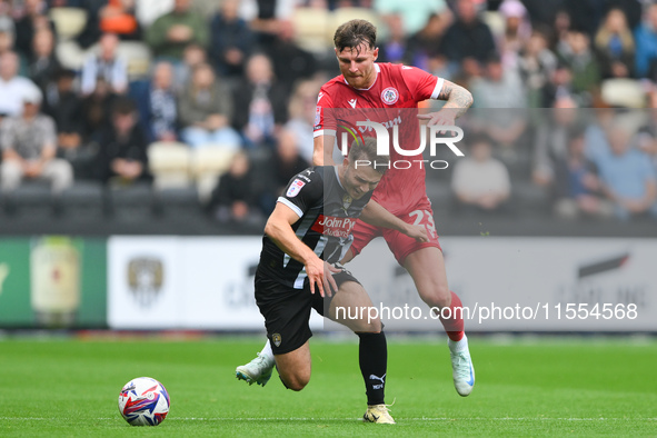 Tyler Walton of Accrington Stanley fouls Nicholas Tsaroulla of Notts County during the Sky Bet League 2 match between Notts County and Accri...