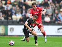 Tyler Walton of Accrington Stanley fouls Nicholas Tsaroulla of Notts County during the Sky Bet League 2 match between Notts County and Accri...