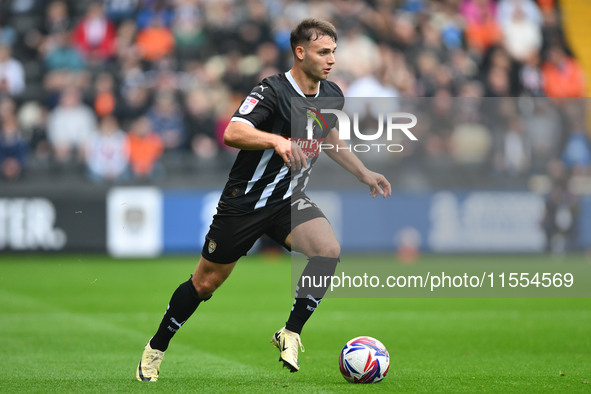 Nicholas Tsaroulla of Notts County runs with the ball during the Sky Bet League 2 match between Notts County and Accrington Stanley at Meado...