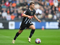 Nicholas Tsaroulla of Notts County runs with the ball during the Sky Bet League 2 match between Notts County and Accrington Stanley at Meado...