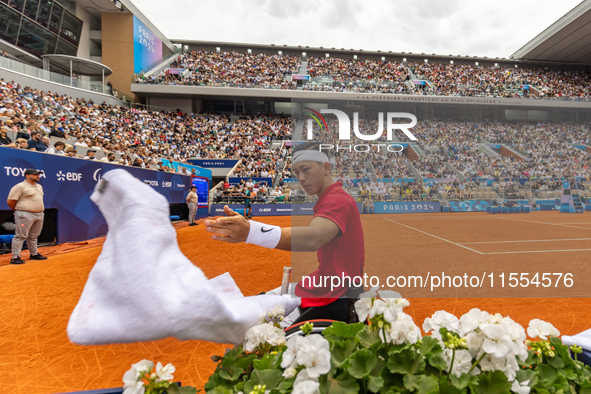 Tokito Oda of Japan competes in the Wheelchair Tennis Men's Singles Gold Medal Match against Alfie Hewett of the UK on Court Philippe Chatri...